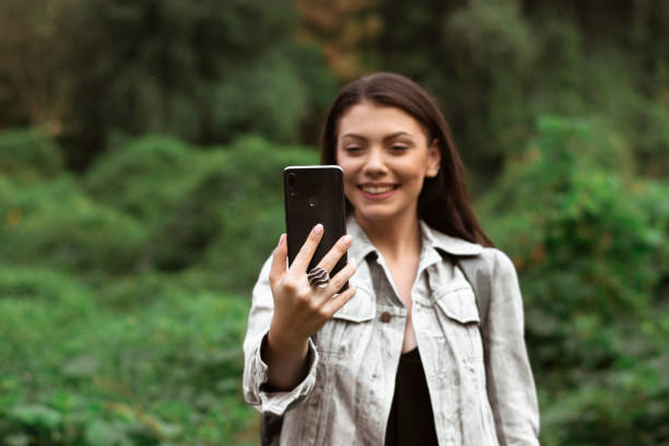 istock Caucasian girl having fun while exploring the nature. 1279661730
