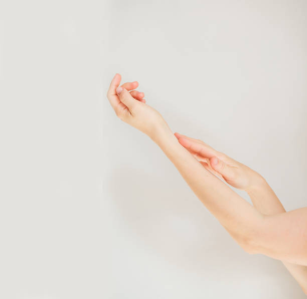 istock Two European womans hands touching each other 1279662129