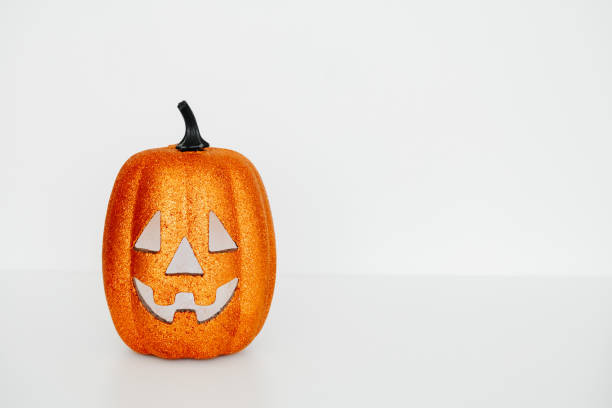istock scary face pumpkin on a white background 1279667034