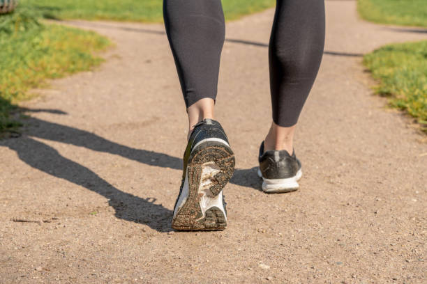 istock woman's legs during outdoor running 1279667138