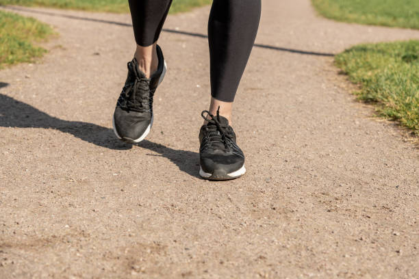 istock woman's legs during outdoor running 1279667151