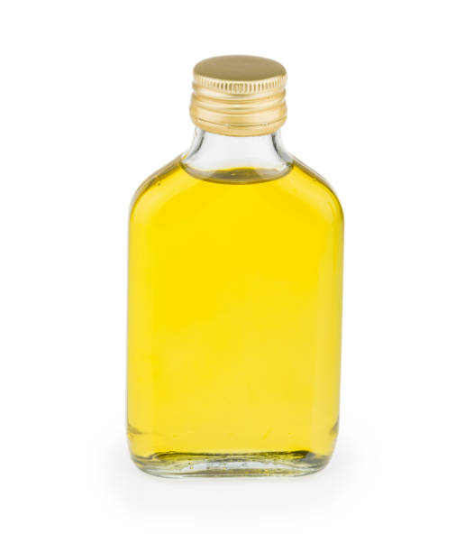 istock bottle with oil isolated on white background 1279668926