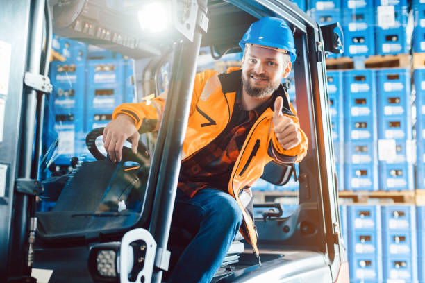 istock Worker showing thumbs up in logistics delivery center 1279670468