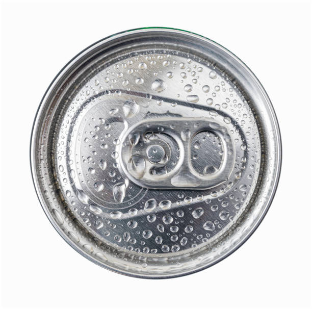 Water drops on a cold beer or soda can top isolated on white background. Drinking on the go beverages in aluminum cans with pull tabs. Water drops on a cold beer or soda can top isolated on white background. Drinking on the go beverages in aluminum cans with pull tabs. Top view. can top stock pictures, royalty-free photos & images