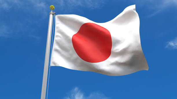 istock Japan Flag in Blue Sky Background 1279671371