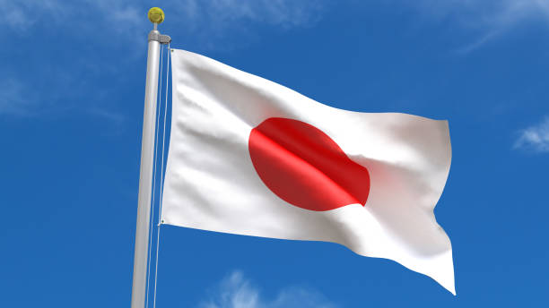 istock Japan Flag in Blue Sky Background 1279671417