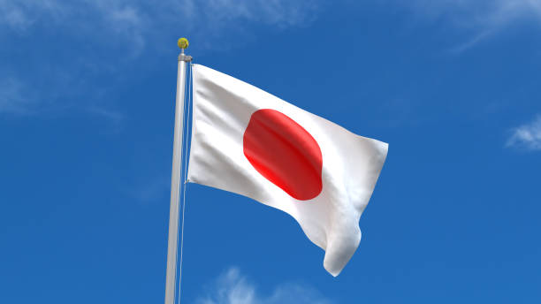 istock Japan Flag in Blue Sky Background 1279671445