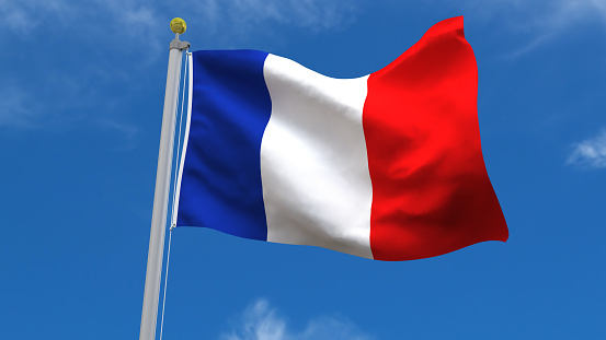France Flag Waving, fluttering against the background of the blue sky with silver pole