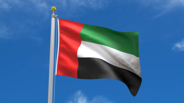 istock United Arab Emirates Flag in Blue Sky Background 1279671514
