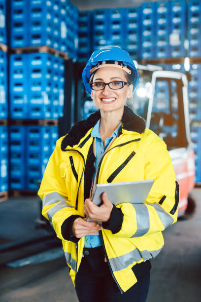 istock Worker woman in a logistics company with a tablet computer 1279671628