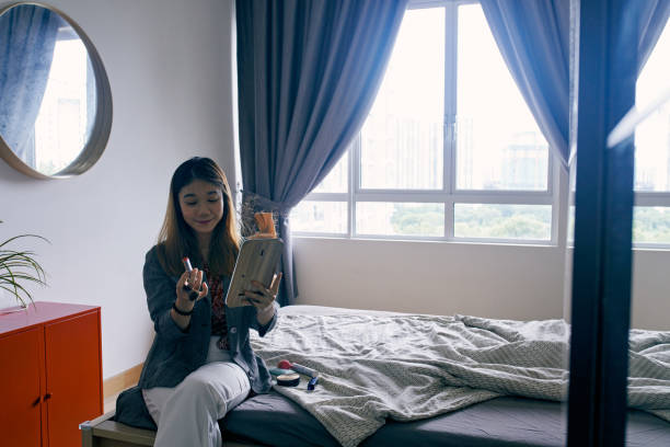 istock Beautiful Chinese Woman Getting Ready and Makeup for Work 1279673459