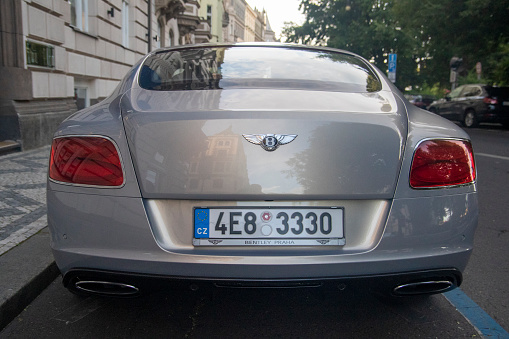 PRAAG,TSJECHIE - 27 JULY 2020: bentley continental gt parked in the center of prague in the color silver metallic\nthis is a luxury english car for those with a lot of mon