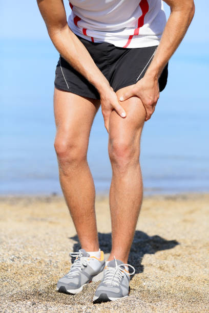 istock Muscle injury. Man runner sprain thigh muscles 1279674552