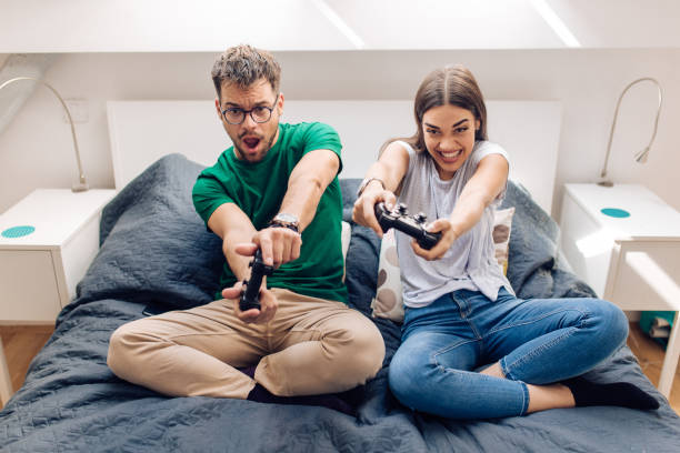 istock Young couple competing in gaming 1279675740