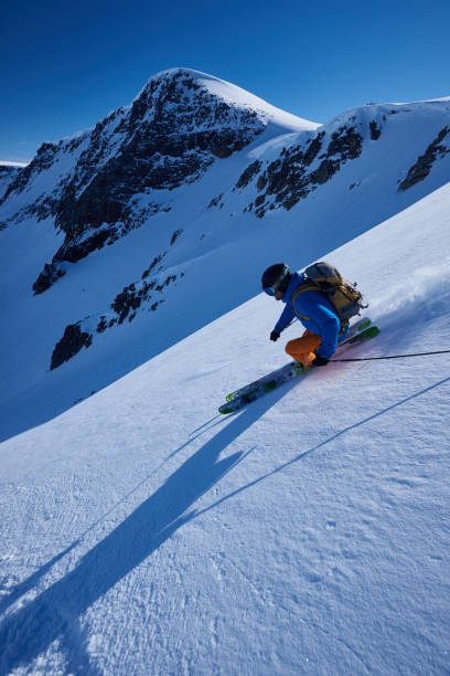 istock Back country skier skiing first track. 1279676560