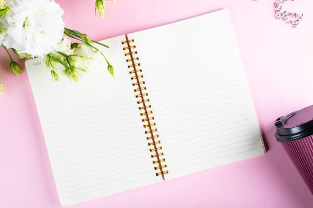 istock Top view flat lay empty note book with flowers. mockup. Text space. women flatly. Women's day flatlay. businesswoman flatlay. Empty notepad 1279678334