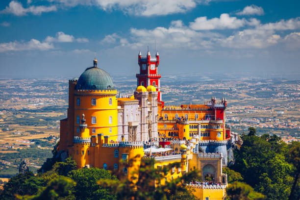 palace of pena in sintra. lisbon, portugal. travel europe, holidays in portugal. panoramic view of pena palace, sintra, portugal. pena national palace, sintra, portugal. - sintra imagens e fotografias de stock
