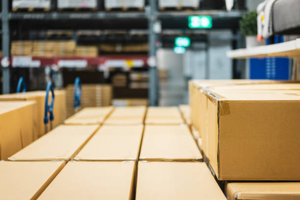 istock Stack of cardboard boxes in smart warehouse industry logistic. 1279679344