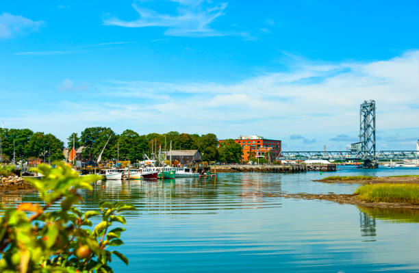 Boats and yachts heading out from the marinas of Plymouth Harbor.