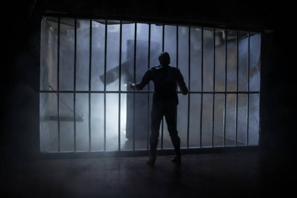 istock Old prison bars cell lock. Creative artwork decoration. Old grunge prison interior. 1279681148