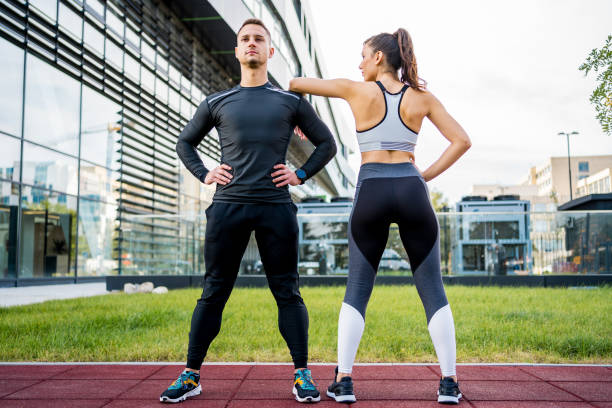 istock Attractive sporty couple standing together 1279681440