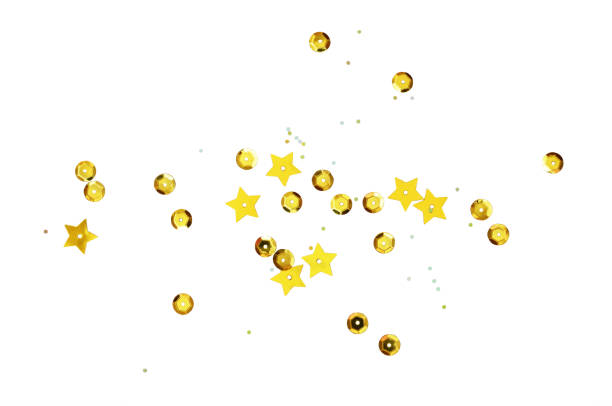 istock Scattered golden seqines and stars isolated on white 1279682232