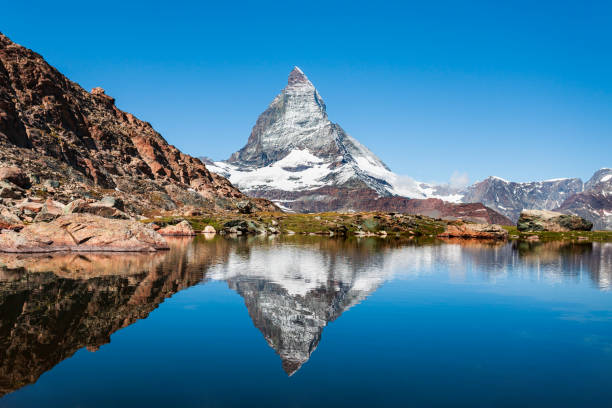 istock Riffelsee lake and Matterhorn, Switzerland 1279684019