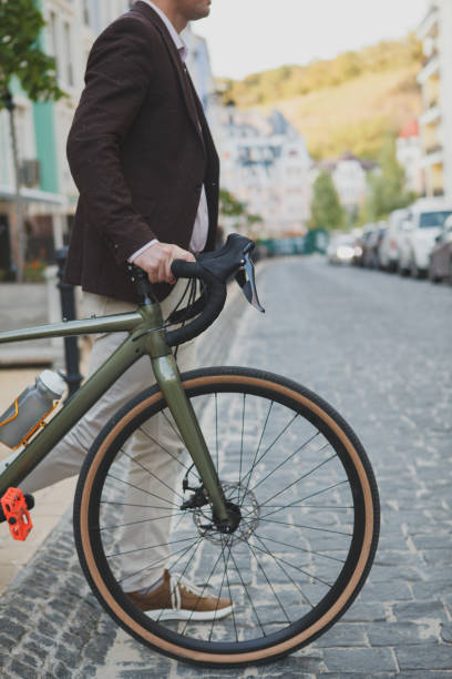 istock Mature man cycling at the city 1279684314