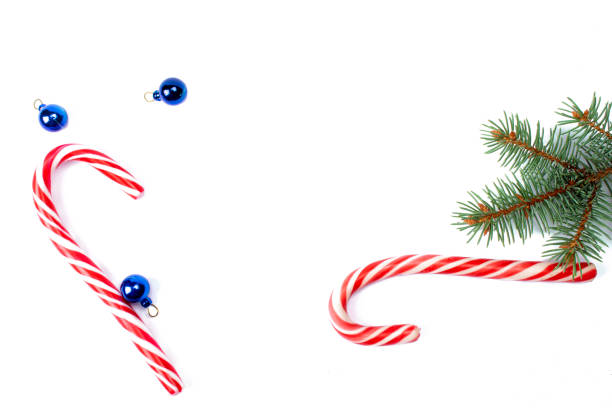 istock Christmas decorations, fir tree branches isolated on white background. Flat lay, top view, copy space. Christmas, winter, new year concept. Christmas composition for design. 1279686344