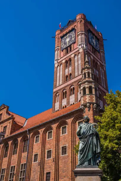 Photo of Vertical shot of Nicolaus Copernicus Statue in Torun, Poland