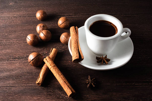 istock cup of coffee and cinnamon sticks 1279692011