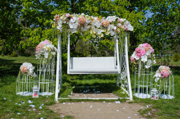 istock Wedding composition decoration in old vintage romantic style with white metal cages 1279692243