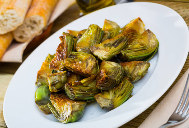 istock Sauteed in oil artichokes 1279694791
