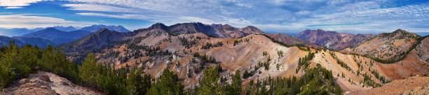 istock Sunset Peak hiking trail views towards Devil’s Castle Sugarloaf Mountain at Alta Resort on Great Western Trail in Rocky Wasatch Front Mountains, Midway and Heber, Utah. United States. 1279695981