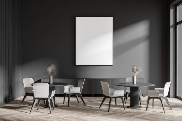 istock Stylish dark gray cafe interior with poster and sofa 1279699413