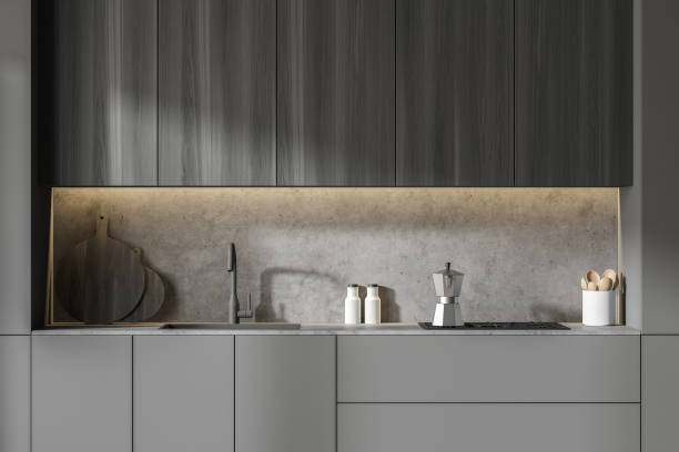 istock Gray and wooden kitchen with cupboards, close up 1279699446