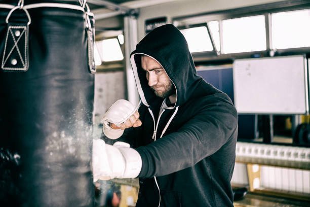 istock Young man box training in the gym 1279701319
