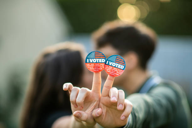 istock Two Women Kiss After Voting 1279703707