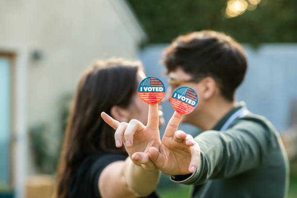 istock Two Women Kiss After Voting 1279703711