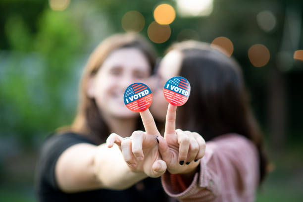istock Two Women Kiss After Voting 1279703714
