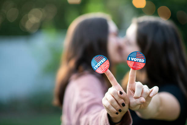 istock Two Women Kiss After Voting 1279703715