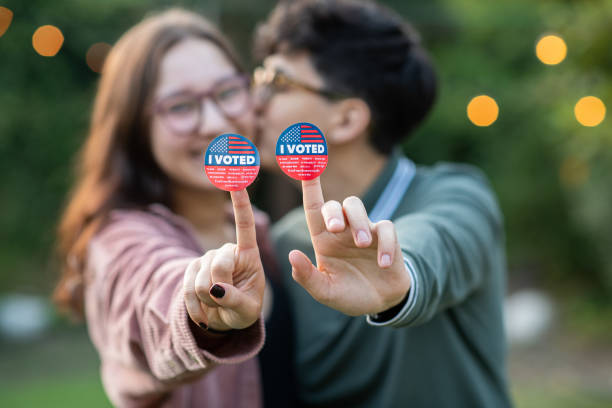istock Two Women Kiss After Voting 1279704369
