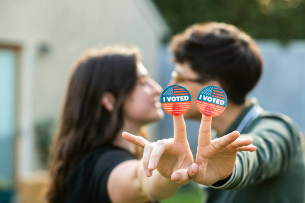 istock Two Women Kiss After Voting 1279704373