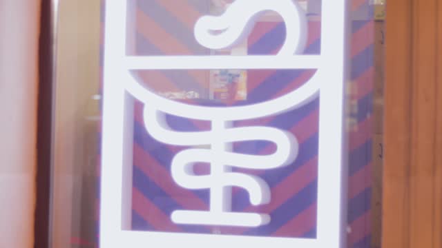 sign icon of medicine with a snake,street shop window of the pharmacy