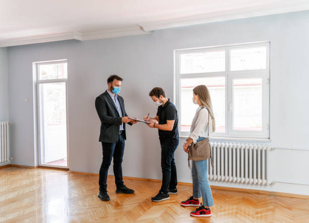 istock Happy Couple Looking New Home 1279705350