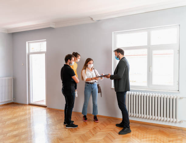 istock Happy Family Looking New Home 1279705510