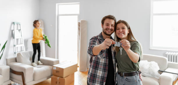 istock holding keys of their new home 1279706157