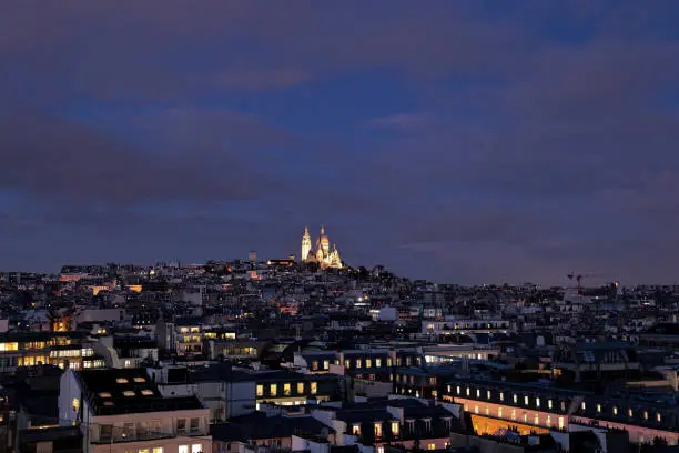 The Basilica of the Sacred Heart of Paris as seen from Galerie Lafayette rooftop terrace.