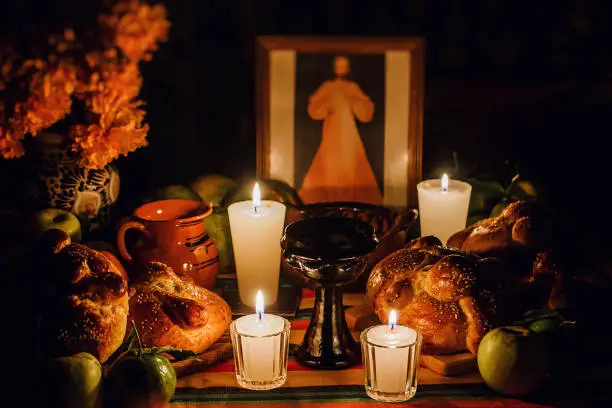 ofrenda día de muertos, Mexican Day of the dead altar, Candles in a offering Mexico