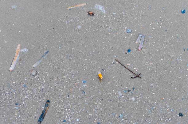 istock Cigarette laying on the Beach 1279716453